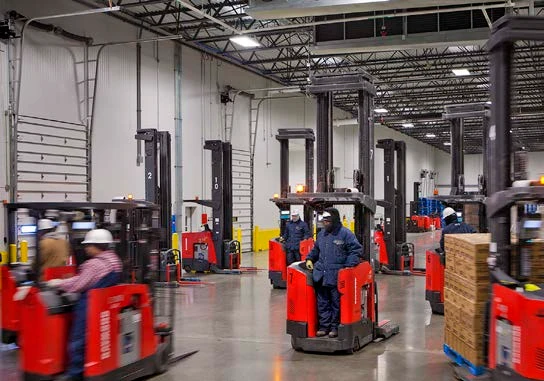 Electric forklift moving in cold storage Electric forklift moving in cold storage