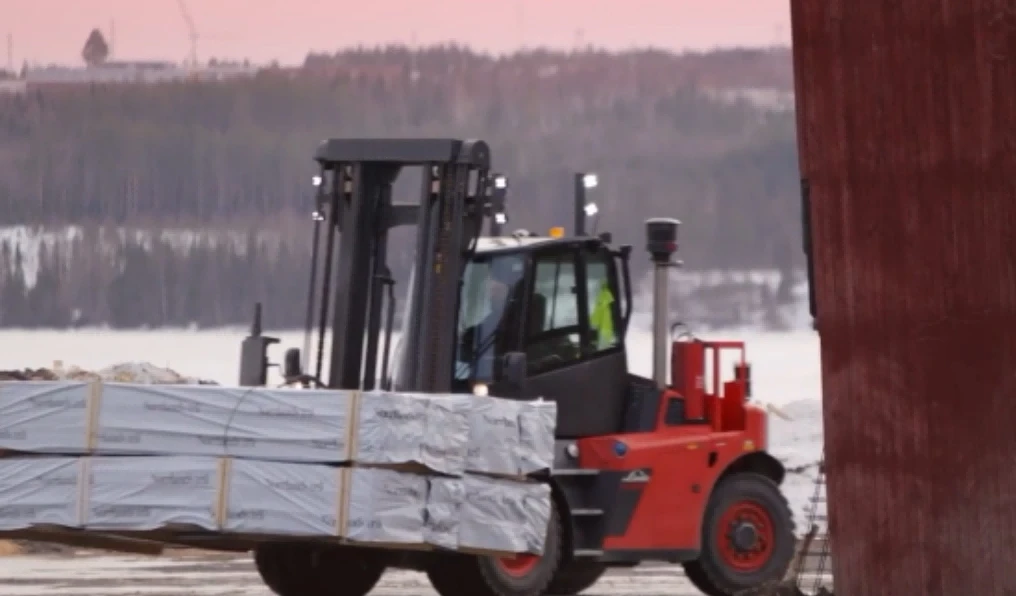 Outdoor steel yard heavy forklift transporting packaged structural steel1 Outdoor steel yard heavy forklift transporting packaged structural steel1