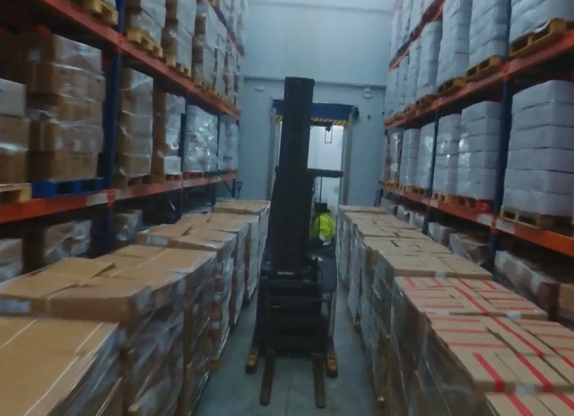 Lithium reachtruck working multishift highrack distribution warehouse1 Lithium reachtruck working multishift highrack distribution warehouse1